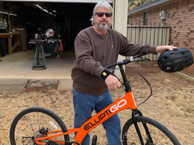 J.R with his ElliptiGO RSUB Stand Up Bike