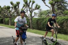 Two Long-Stride Bike riders head on