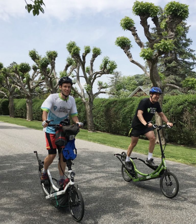 Two Long-Stride Bike riders head on