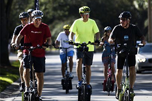 Group of Long-Stride Bike riders