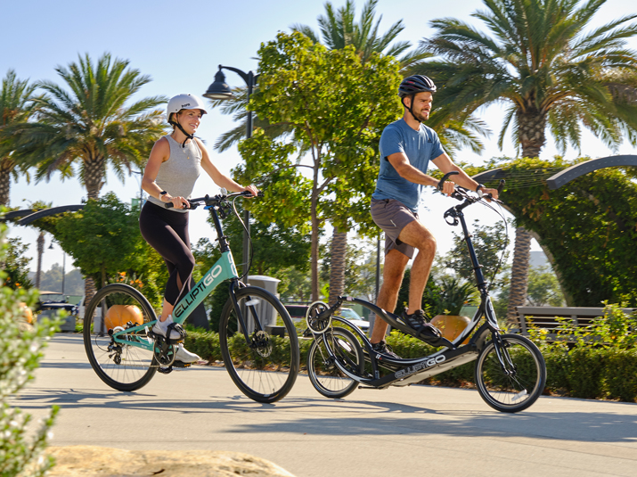 Two Riders on different bikes, side